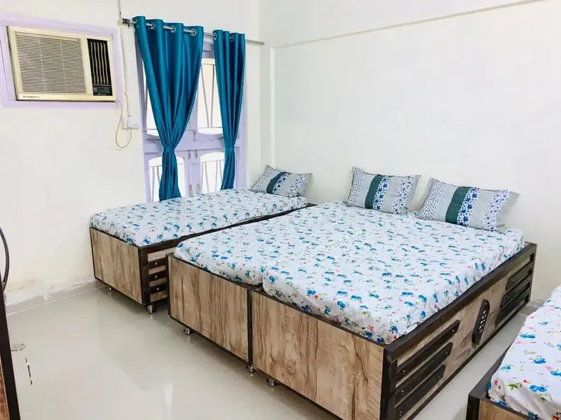 Clean AC Girls PG Room with Under-bed Storage Drawers in Navrangpura