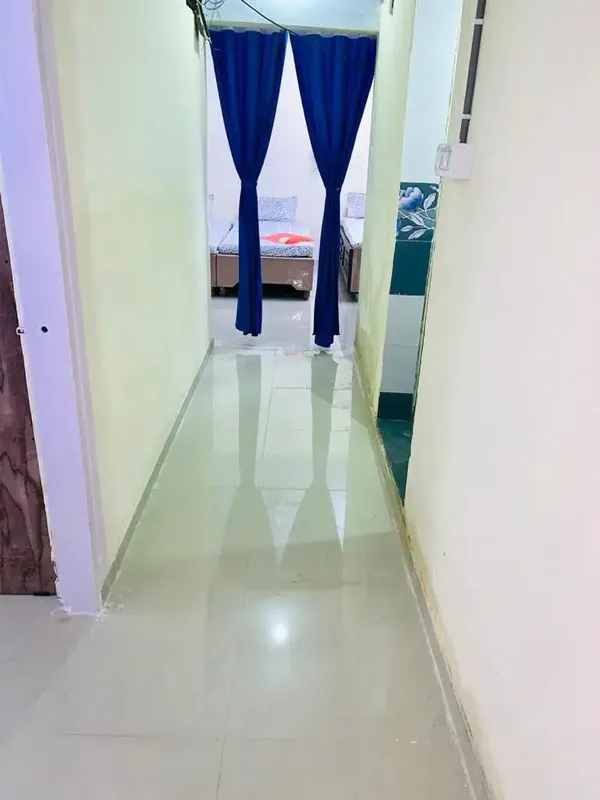 Clean and Well-Maintained Lobby Corridor at City House Girls PG